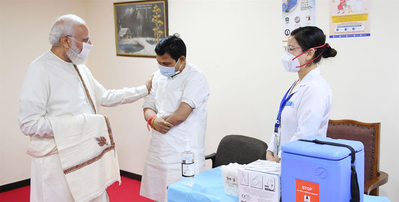 The Prime Minister, Shri Narendra Modi visits the vaccination centre at Dr. Ram Manohar Lohia Hospital as India achieves 100 crore vaccination mark, in New Delhi.